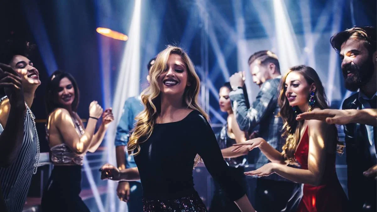 People dancing in a night club with lots go light on the Las Vegas Party Bus Club Crawl in Las Vegas, Nevada, USA